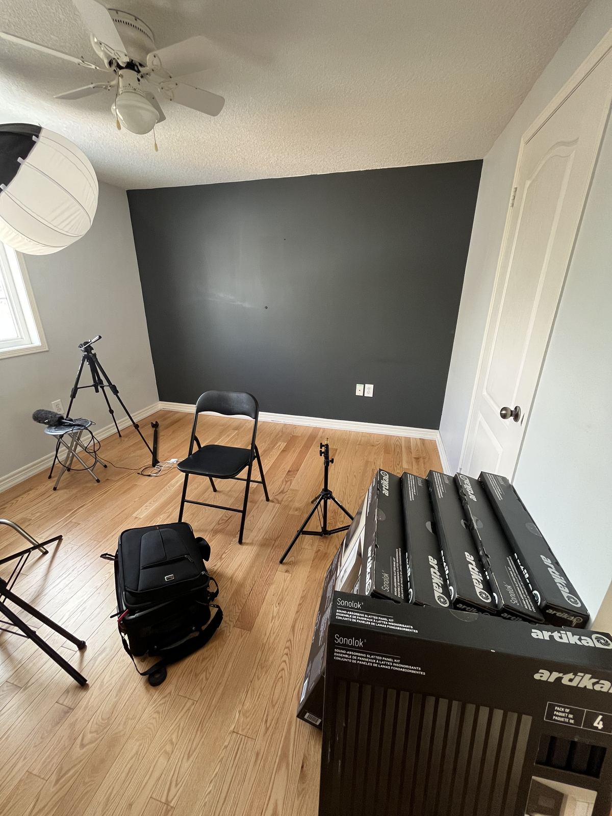 Home studio before - empty room with equipment boxes